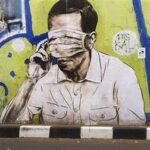 15 street art unik menghiasi sudut kota Indonesia, menampilkan karakter kartun nyungsep yang memikat mata serta mengangkat budaya lokal dalam kanvas jalanan