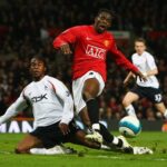 Louis Saha mengkritik masalah Manchester United, menyoroti gaya bermain Michael Carrick yang dianggap terlalu lambat